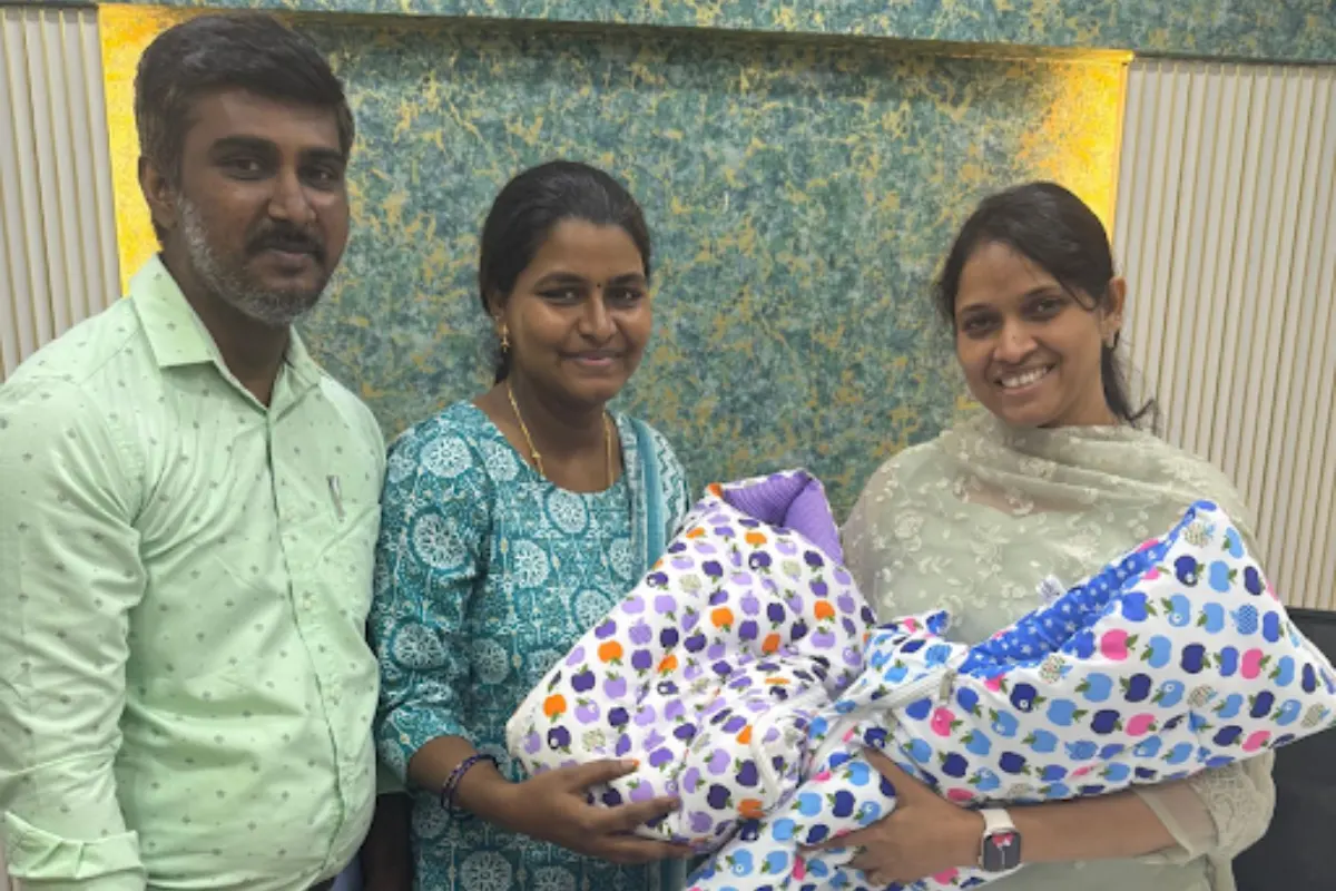 Happy couple with their newborn after IVF success